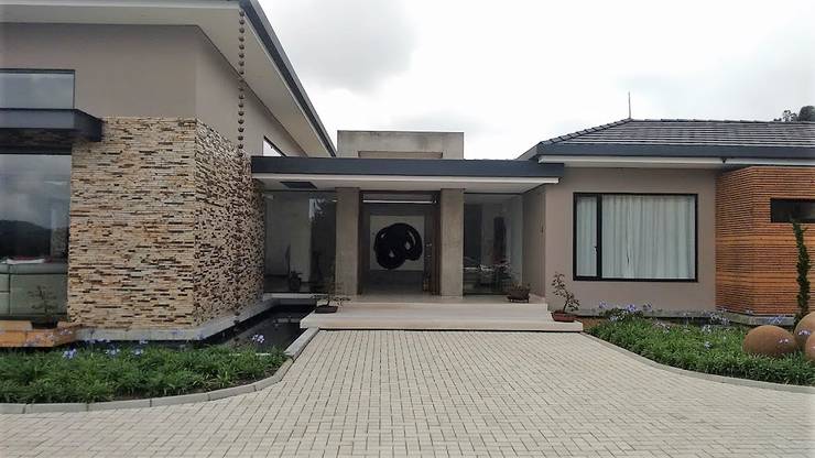 Projekty,  Dom rustykalny zaprojektowane przez Espacios Positivos