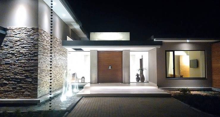 Projekty,  Dom rustykalny zaprojektowane przez Espacios Positivos