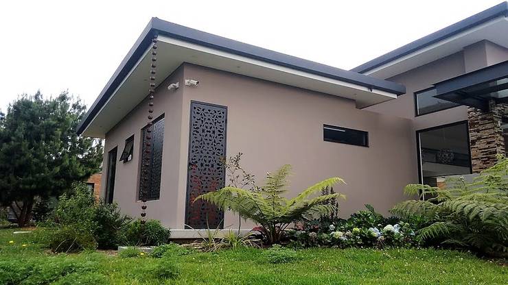 Projekty,  Dom rustykalny zaprojektowane przez Espacios Positivos