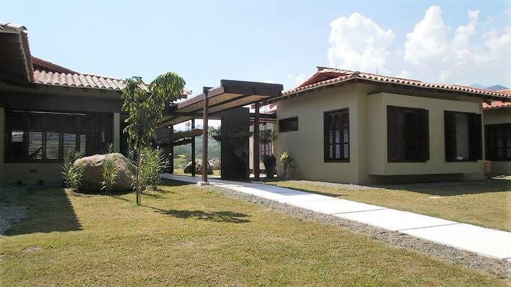 Projekty,  Dom rustykalny zaprojektowane przez Espacios Positivos