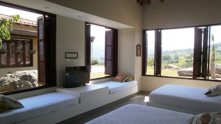 Projekty,  Dom rustykalny zaprojektowane przez Espacios Positivos