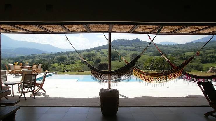 Projekty,  Dom rustykalny zaprojektowane przez Espacios Positivos