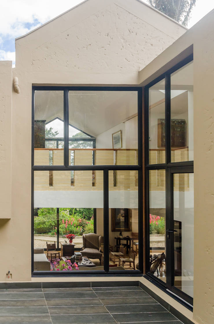 Casas de campo de estilo  por ARCE S.A.S