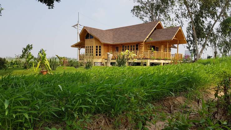  房子 by Sukjai Logcabin Partnership