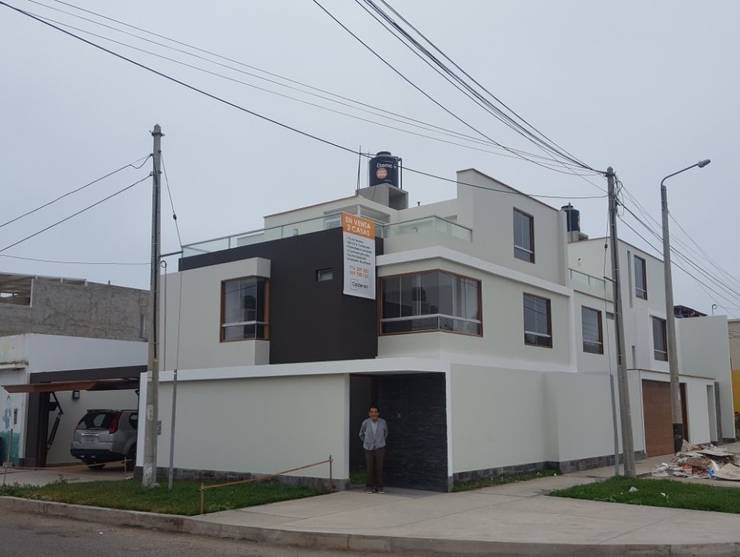 Fachada: Casas unifamiliares de estilo  por RAUM Estudio