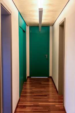 Madeira e concreto formam apê estiloso