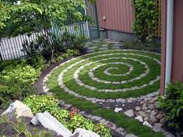 29 meravigliose idee per un giardino piccolo Aiuole da giardino con sassi