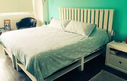 Camera da letto in stile in stile Rustico di Biogibson