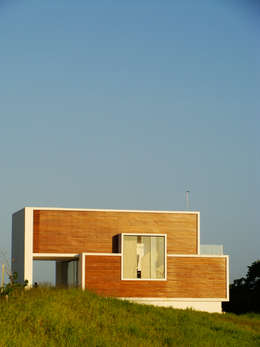 Casa Bromélia:   por Urban Arquitetura