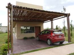 Puerto Roldán - Lote 390: Casas de estilo moderno por Erb Santiago