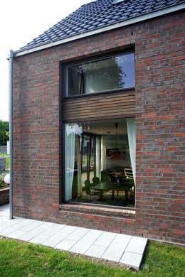 Kleines Einfamilienhaus im modernen Backstein-Look