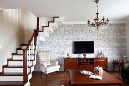 Salas de estar clássicas por Öykü İç Mimarlık