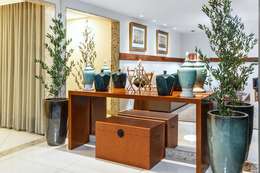 Condominio Puerto Madero: Corredores e halls de entrada  por DUE Projetos e Design