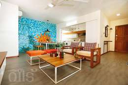 The Rising Sun Apartment: eclectic Living room by S Squared Architects Pvt Ltd