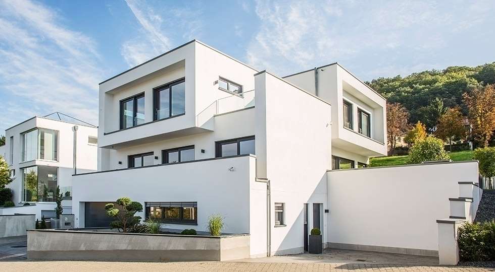 hausentwurf herausragende kuben von okal haus gmbh | homify hausentwurf herausragende kuben von okal haus gmbh | homify, Attraktive mobel