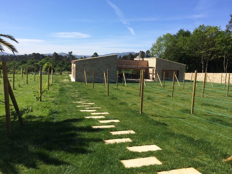 HUGA ARQUITECTOS Case in stile rustico