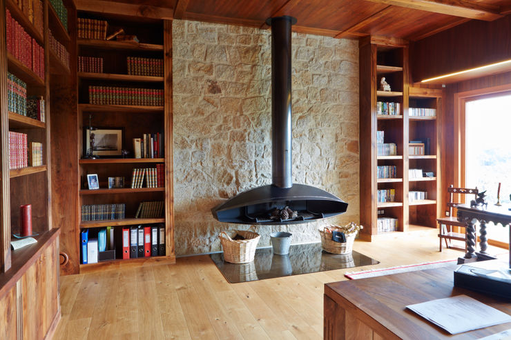 HUGA ARQUITECTOS Case in stile rustico