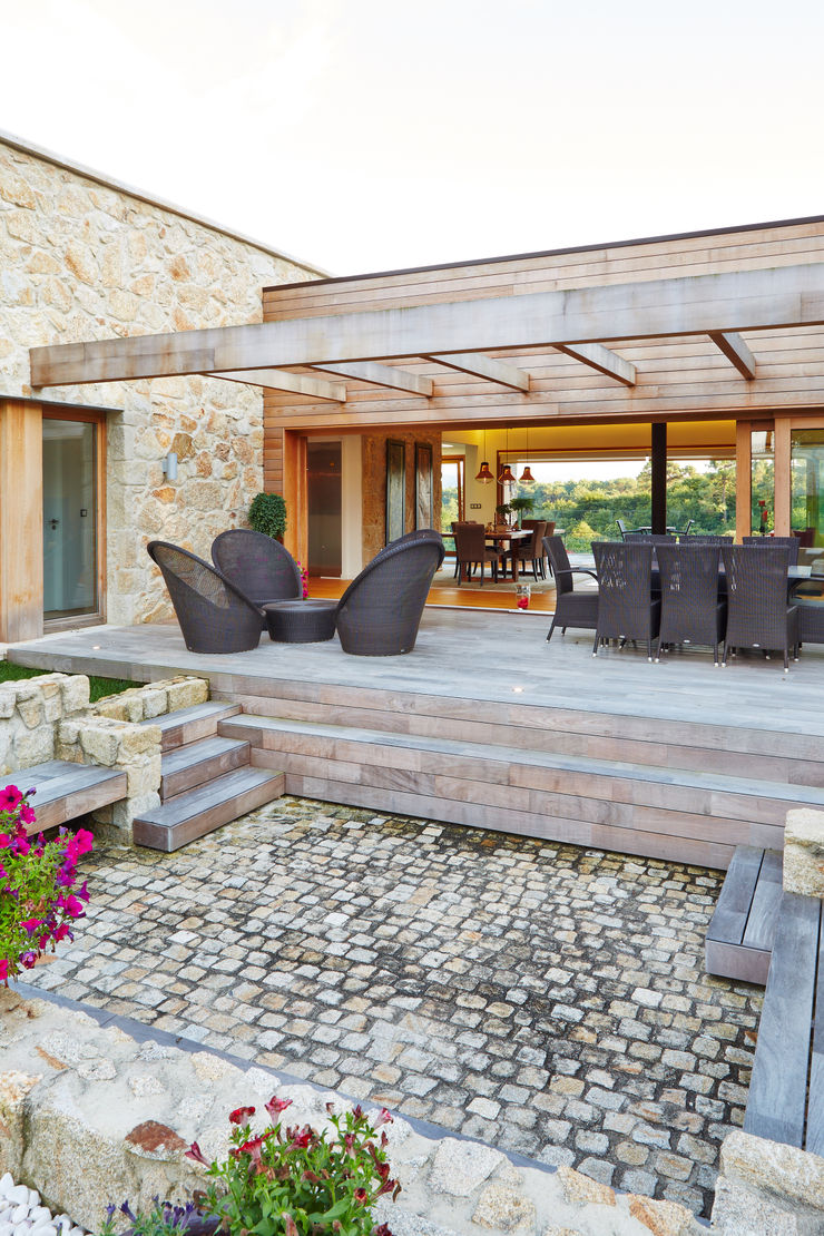 HUGA ARQUITECTOS Case in stile rustico