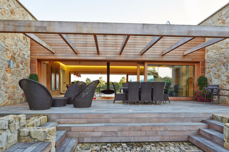 HUGA ARQUITECTOS Case in stile rustico