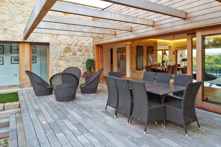 HUGA ARQUITECTOS Case in stile rustico