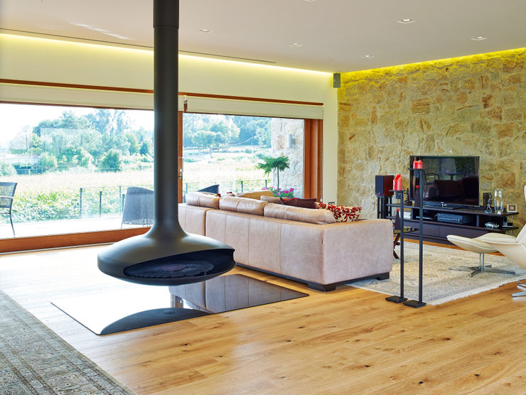 HUGA ARQUITECTOS Case in stile rustico