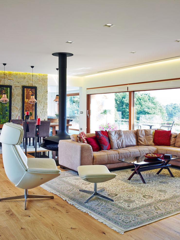 HUGA ARQUITECTOS Case in stile rustico