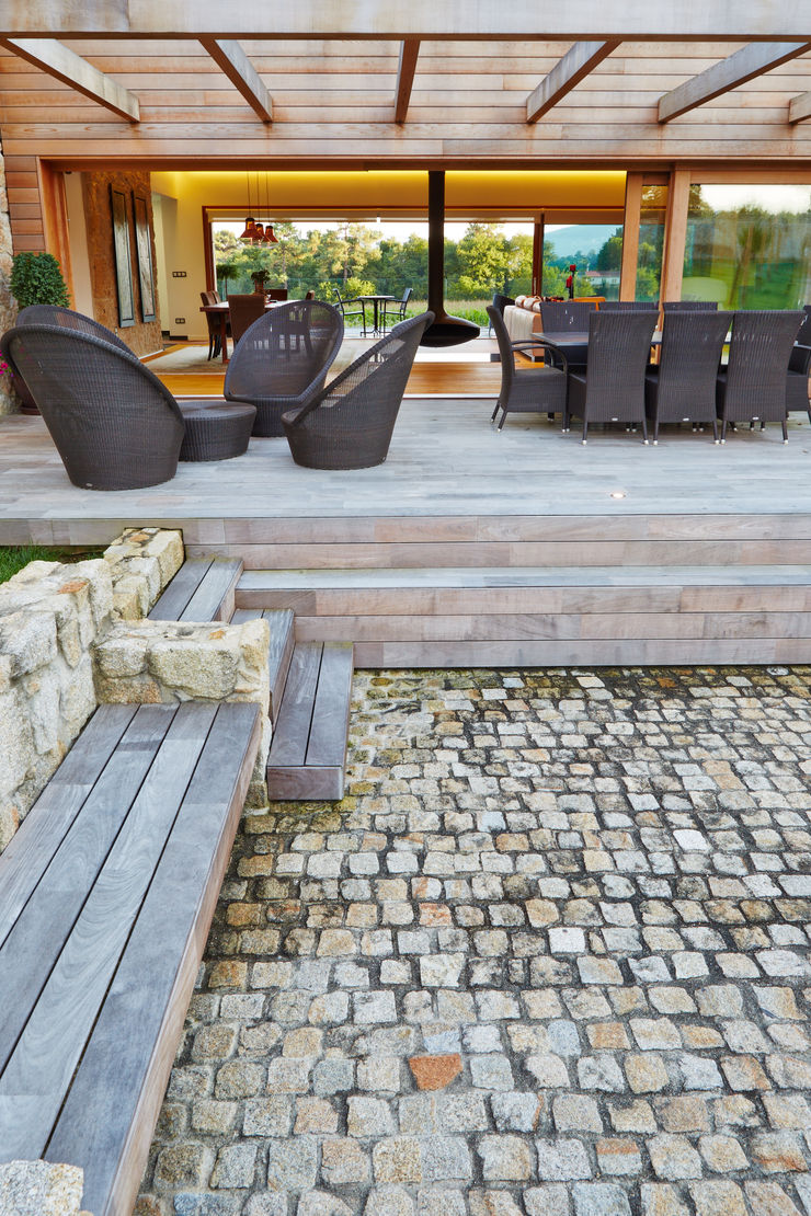 HUGA ARQUITECTOS Case in stile rustico