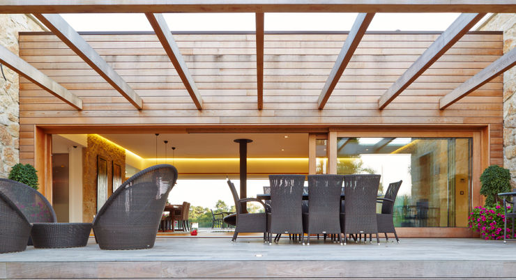 HUGA ARQUITECTOS Case in stile rustico