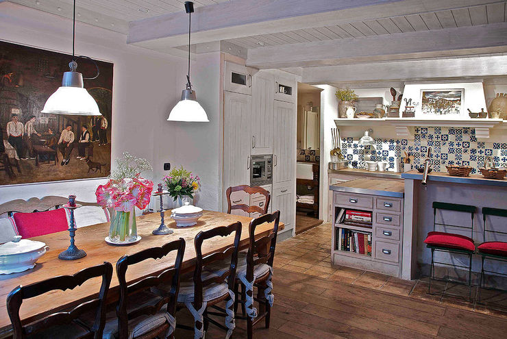 Urbana Interiorismo Rustic style dining room