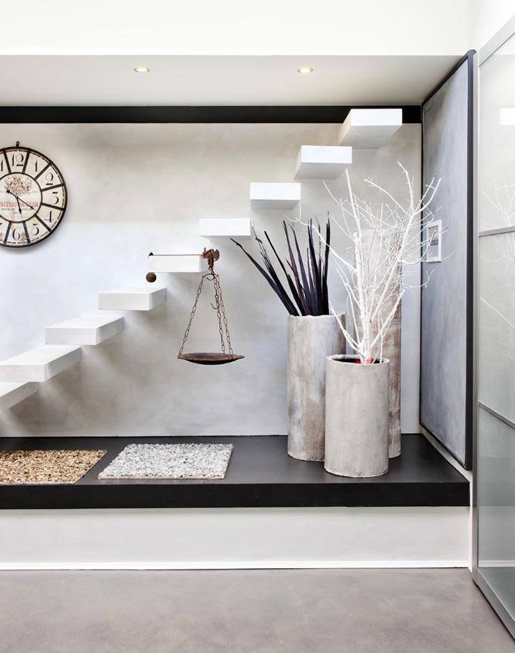 show-room a San Zeno Naviglio Resin srl Pareti & Pavimenti in stile moderno