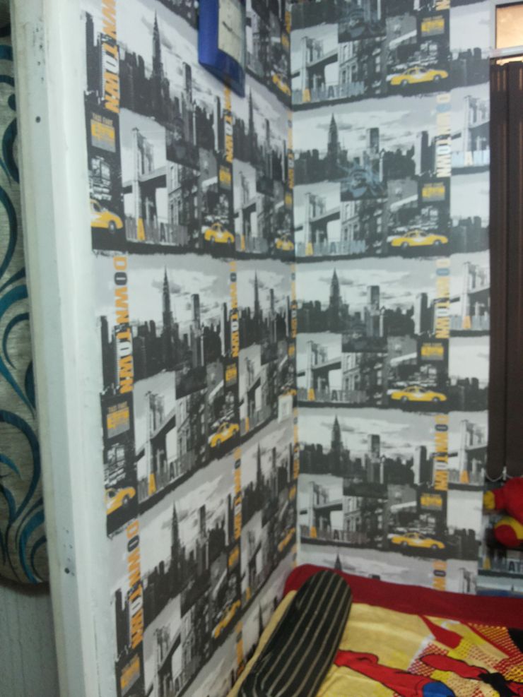 Ajnara Residential Apartment. Decor At Door Tropical style bedroom