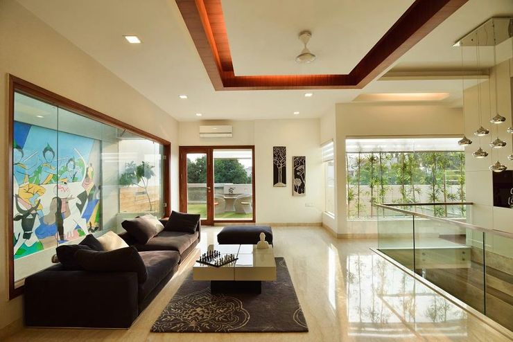 GAJENDRA YADAV'S RESIDENCE Spaces Architects@ka Modern living room