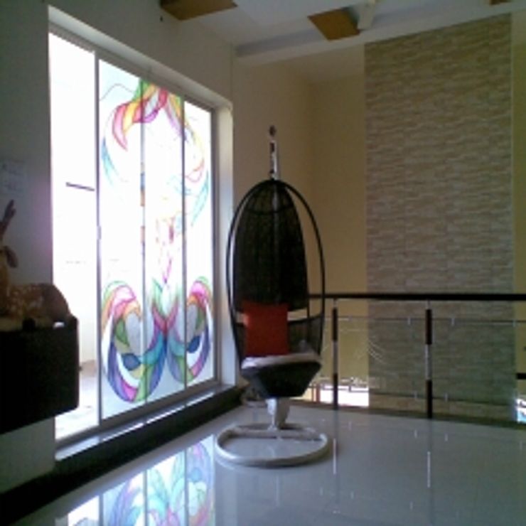 GAJENDRA YADAV'S RESIDENCE Spaces Architects@ka Modern living room