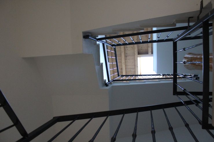 Realizzazioni Adami|Zeni Ingegneria e Architettura Ingresso, Corridoio & Scale in stile moderno