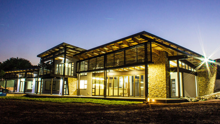 TJ Architects Дома в стиле модерн Кирпичи Бежевый