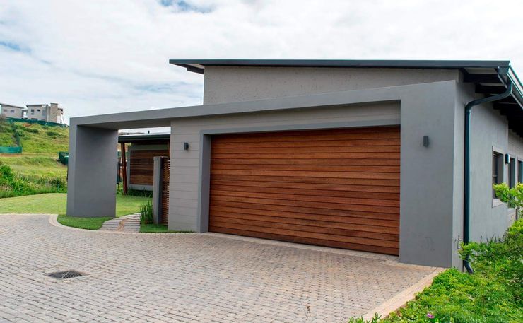 11 間含密閉式車庫的現代風住宅 Homify