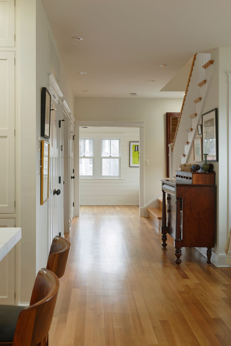 Stylish First-Floor Bungalow Renovation in Arlington, VA BOWA - Design Build Experts Minimalist corridor, hallway & stairs