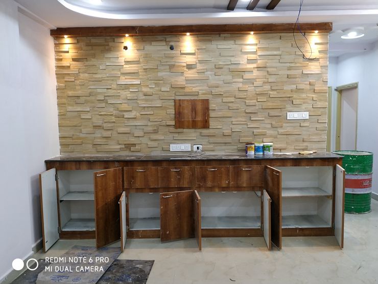 Madurawada work Mm interors Industrial style living room