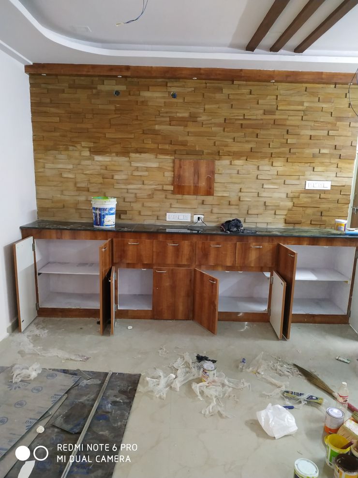 Madurawada work Mm interors Industrial style living room