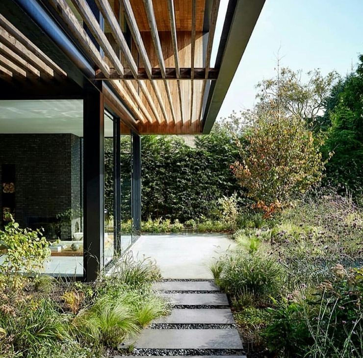 Casa in legno passiva Green Living Ltd Giardino moderno