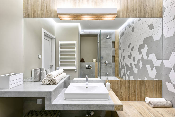 Baños de estilo escandinavo por Partner Design