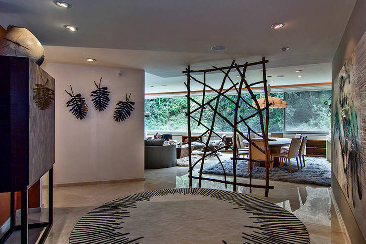 Residencia Toronjos: Salas de estilo moderno por Olivia Aldrete Haas
