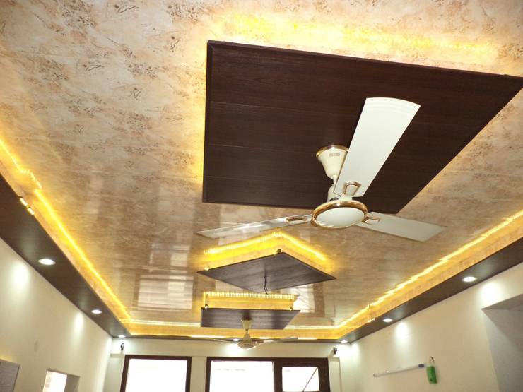 False ceiling design and wallpaper by Mohali Interiors ...