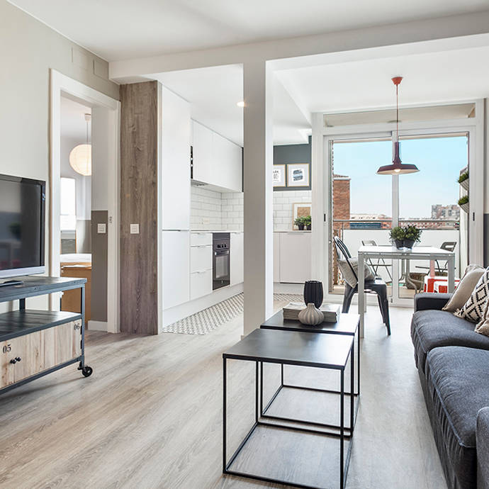 Proyecto Constitució : Salones de estilo industrial de Dröm Living