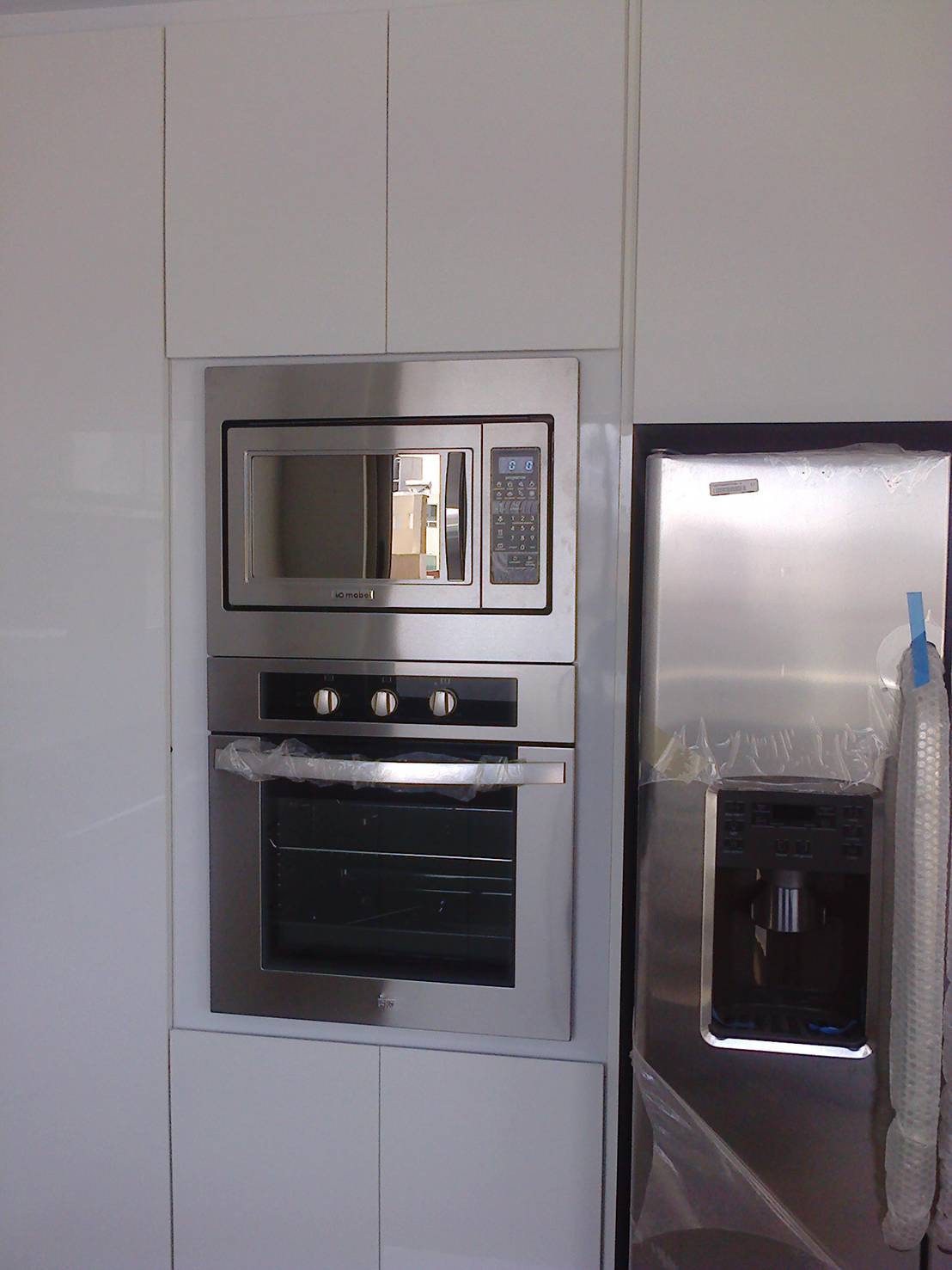 COCINA BLANCO BRILLANTE CON GRANITO | 호미파이 & homify