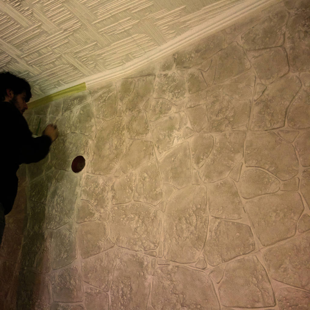 Finta pietra: pannelli o carte da parati? Rivestimento in gesso effetto pietra