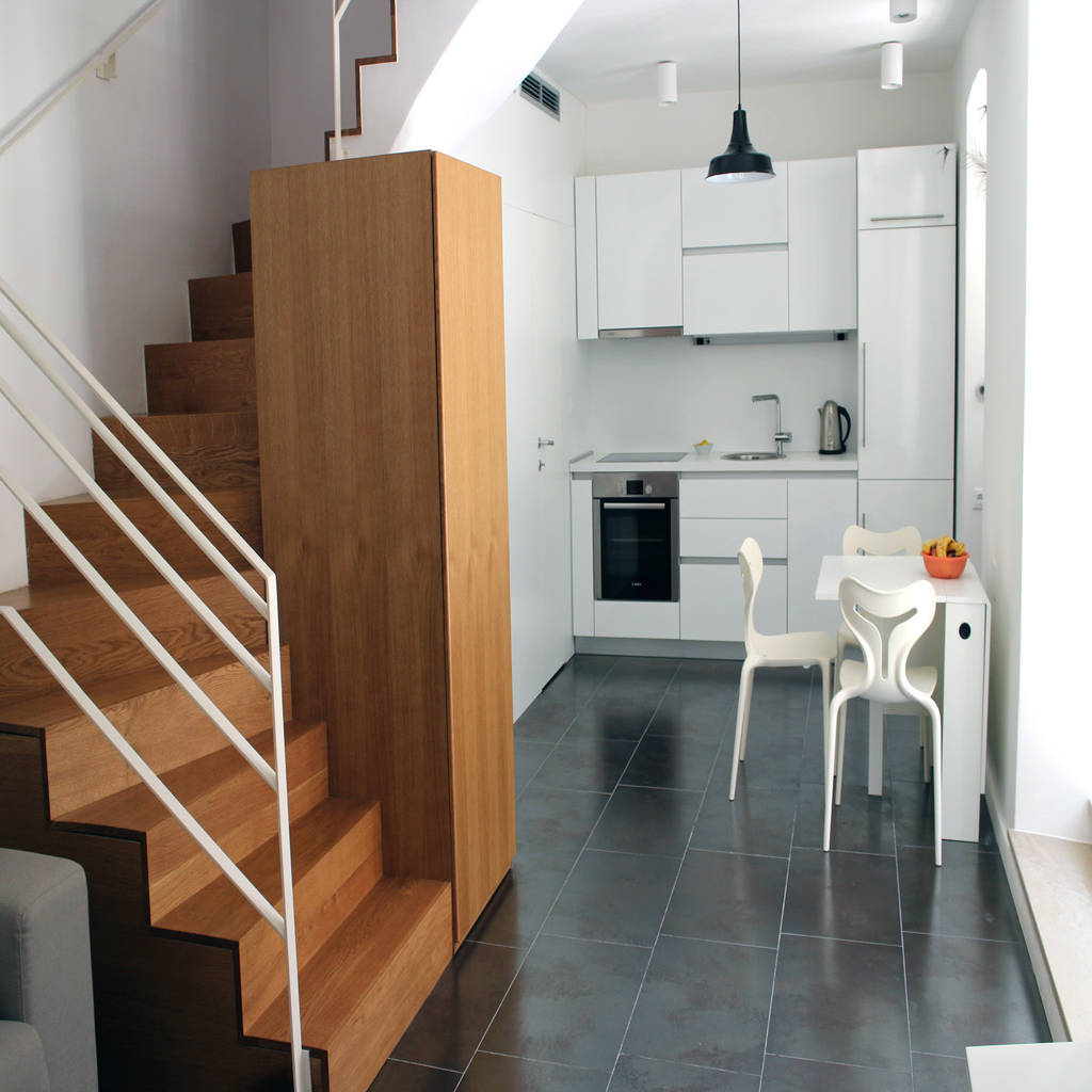 Kitchen with the stairs in the left corner | homify