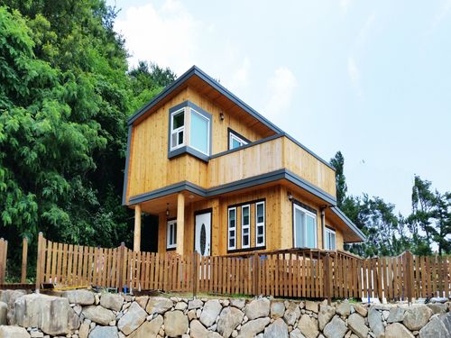 Simple Small Wooden House Design Ideas - WoodsInfo
