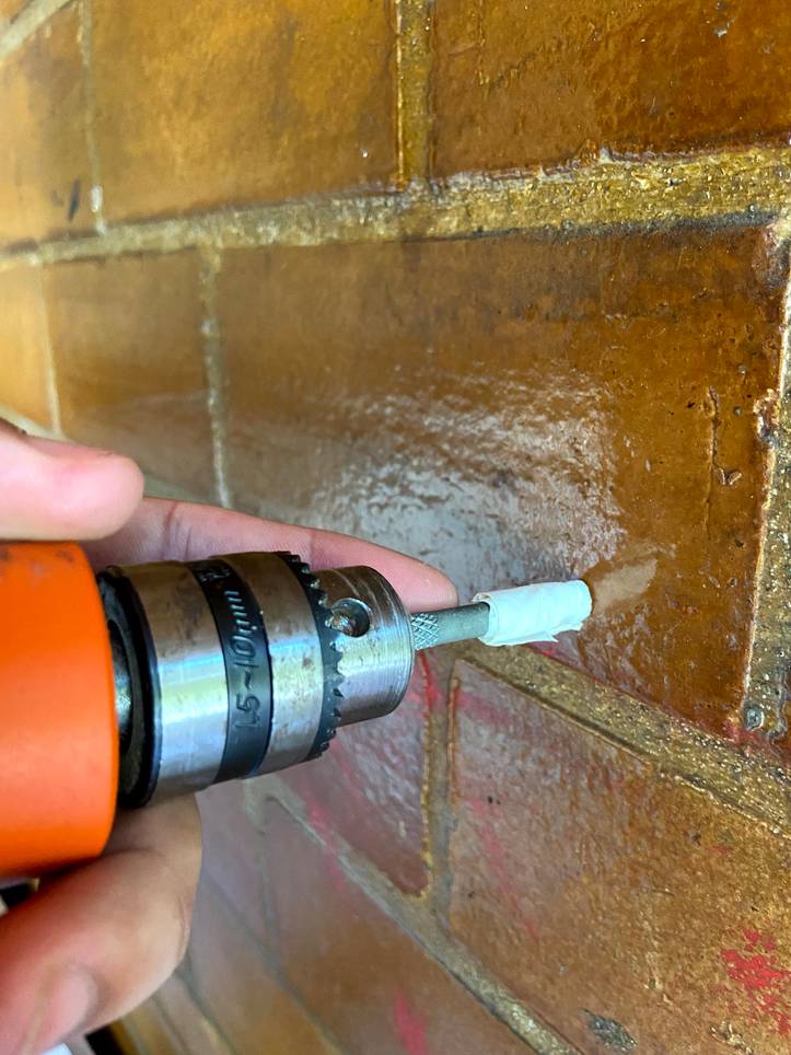 How To Drill Into A Brick Wall
