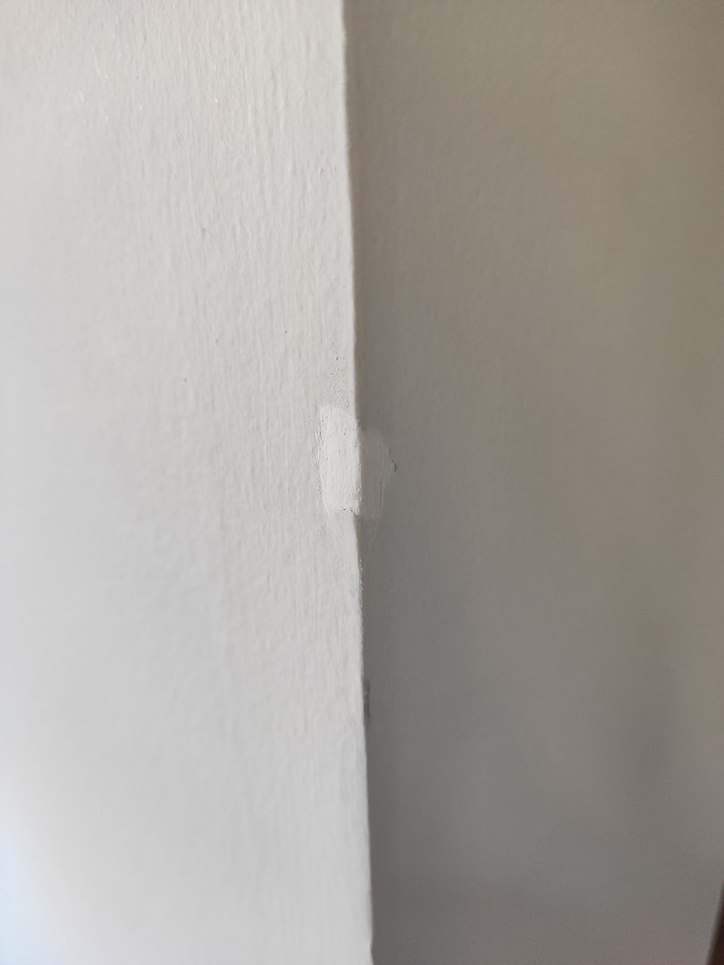 best way to cover holes in wall